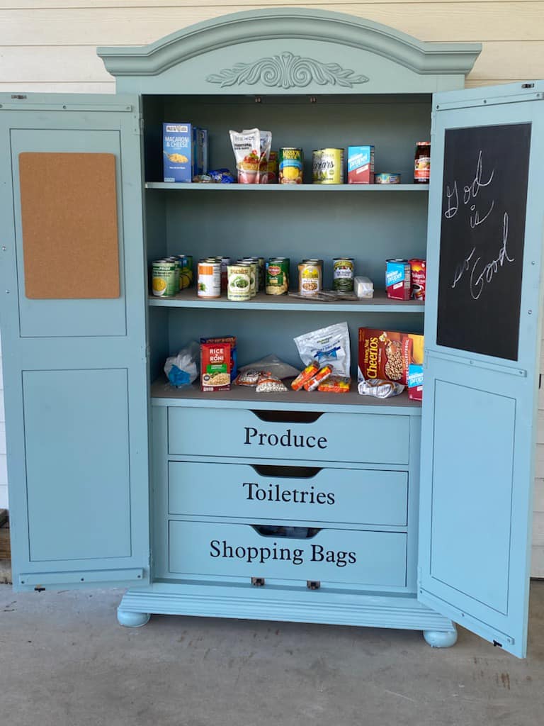 The Little Free Pantry open and stocked with food and essentials